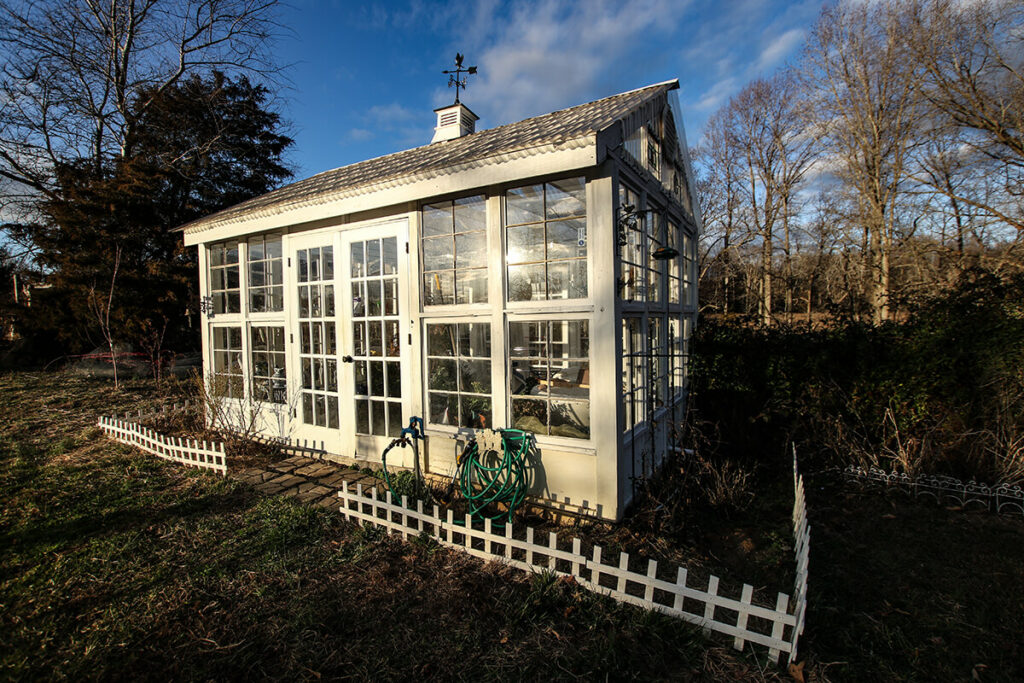 Beautiful Exterior of a White Victorian Style custom built greenhouse