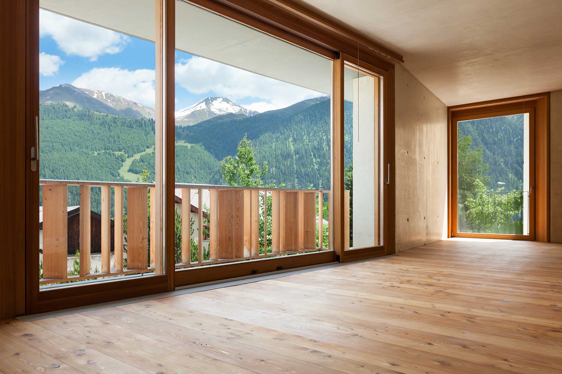 Floor to Ceiling Windows with hardwood floors