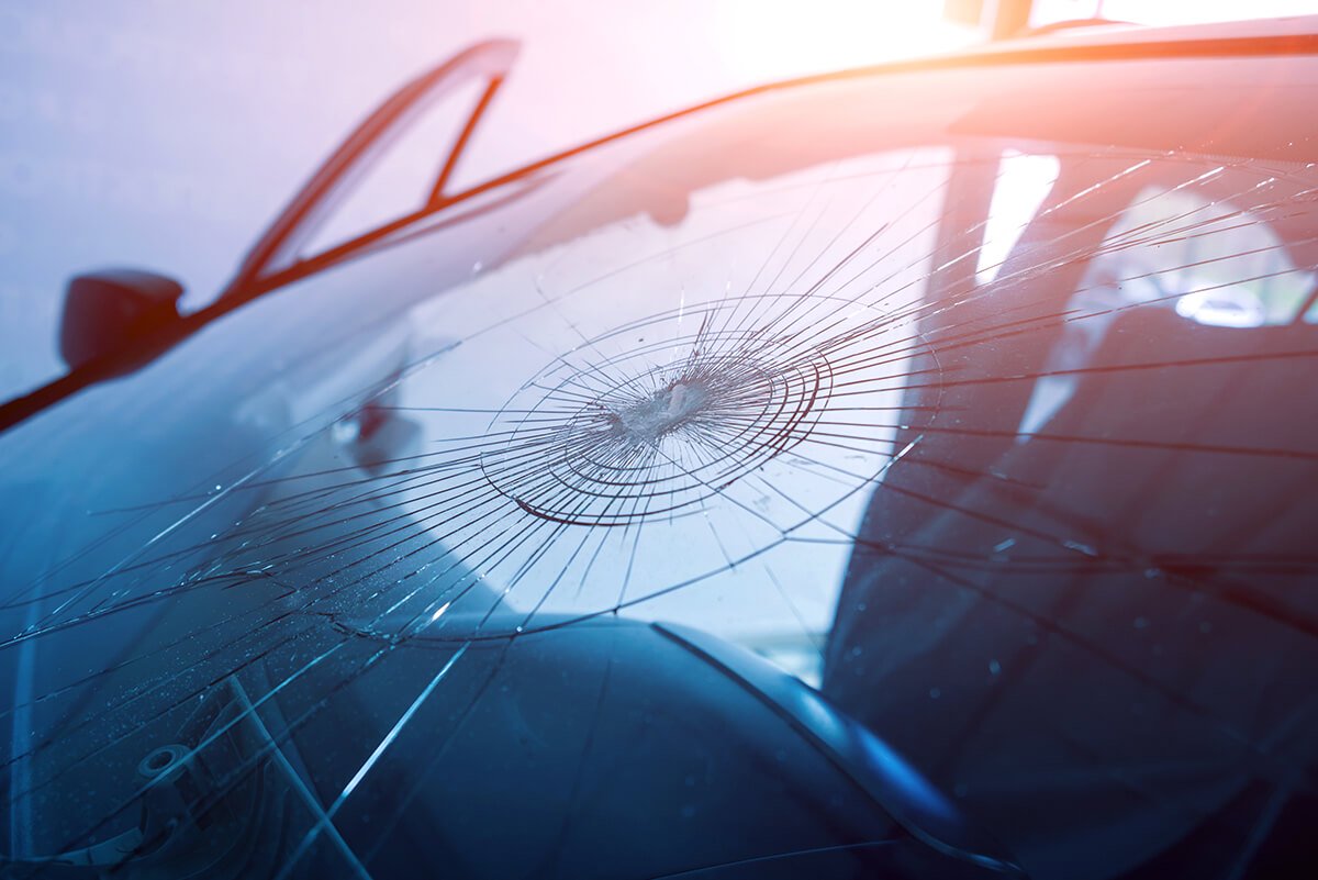 Automobile special workers remove old windscreen