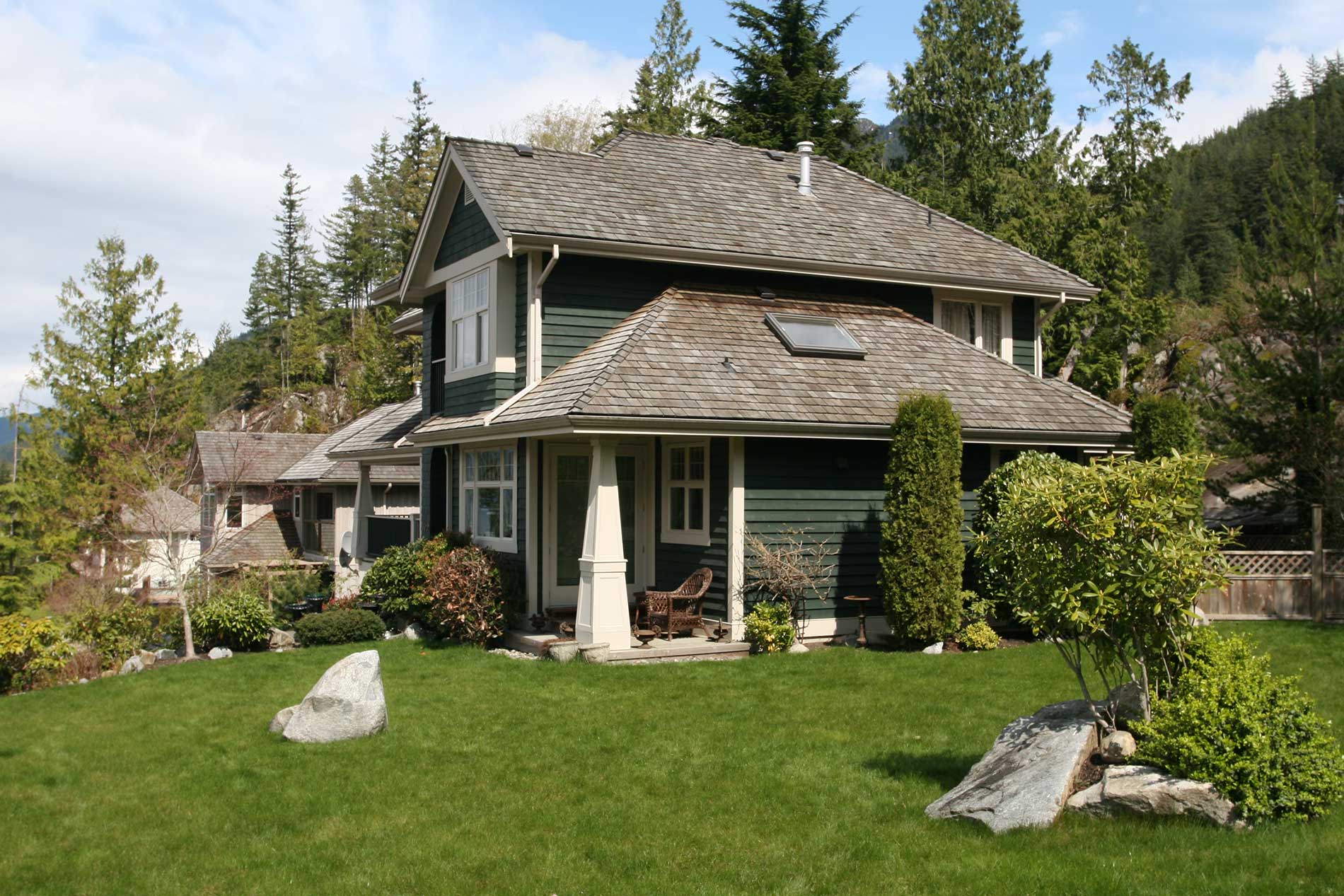 Home-on-a-hill-with-trees-around-it