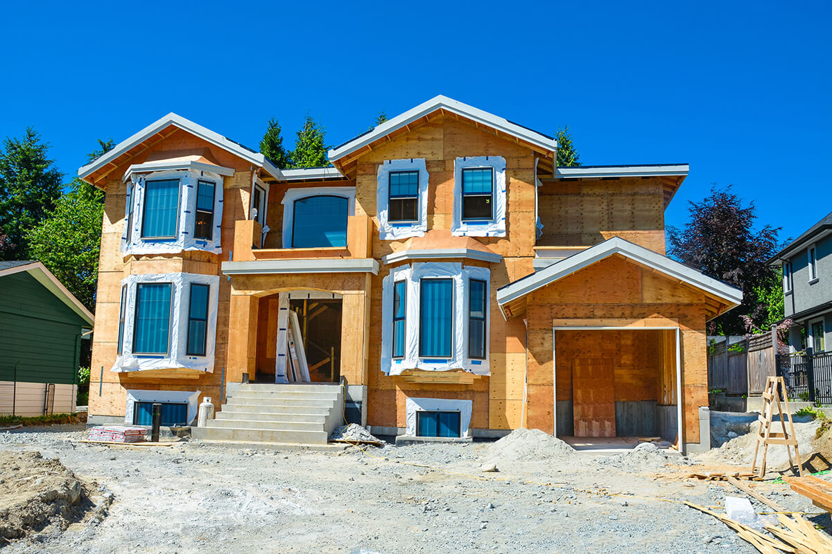 The house has been framed and plywood installed